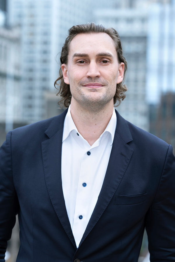 Professional corporate headshot by Lena Di