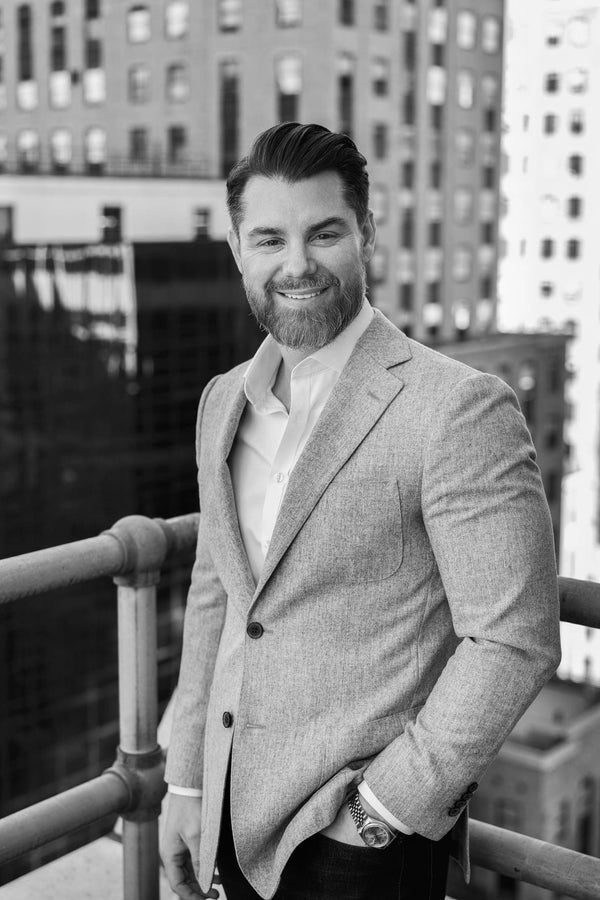 Professional corporate headshot by Lena Di