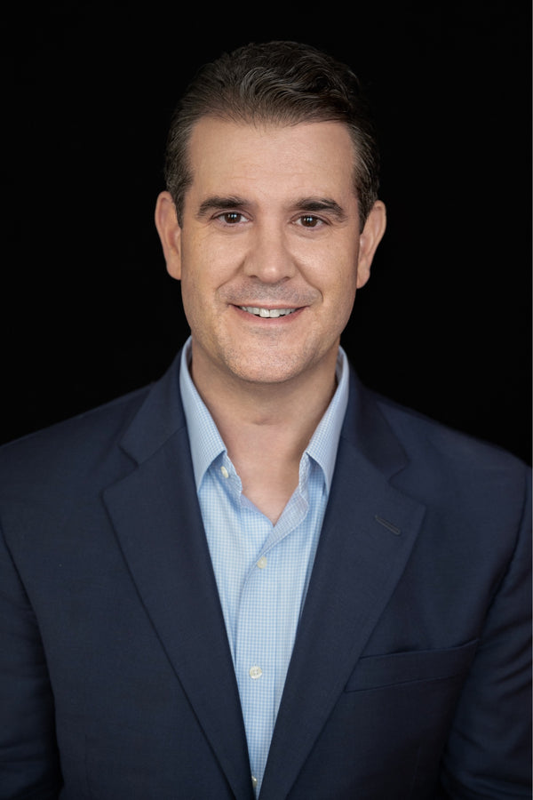 Professional corporate headshot by Lena Di