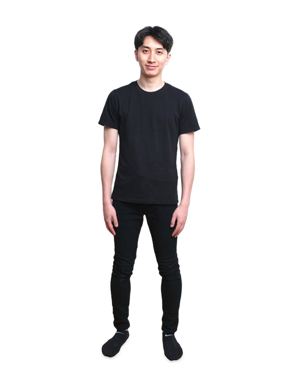 Actor headshot on white, full-length digital in a black tee and jeans, NYC actor headshot photographer Lena Di