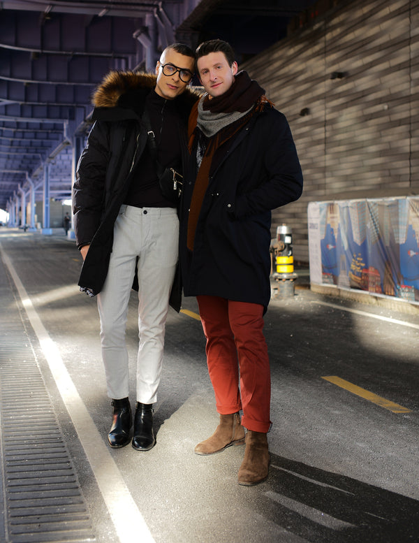Couple standing together in the sunlight under an elevated New York highway, NYC couples photography by Lena Di