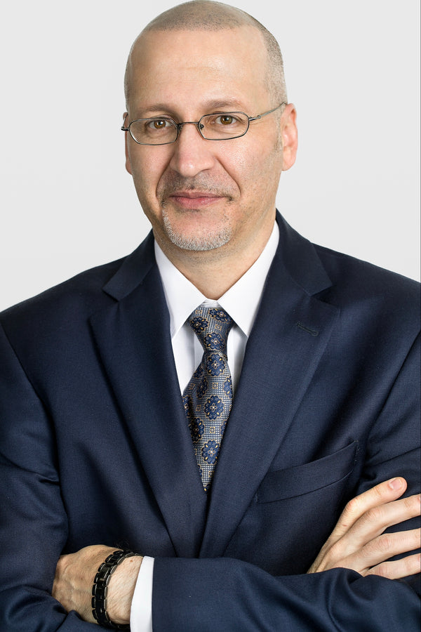 Professional corporate headshot by Lena Di