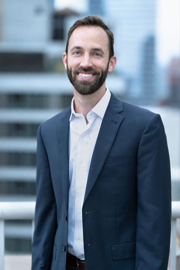 Professional corporate headshot by Lena Di