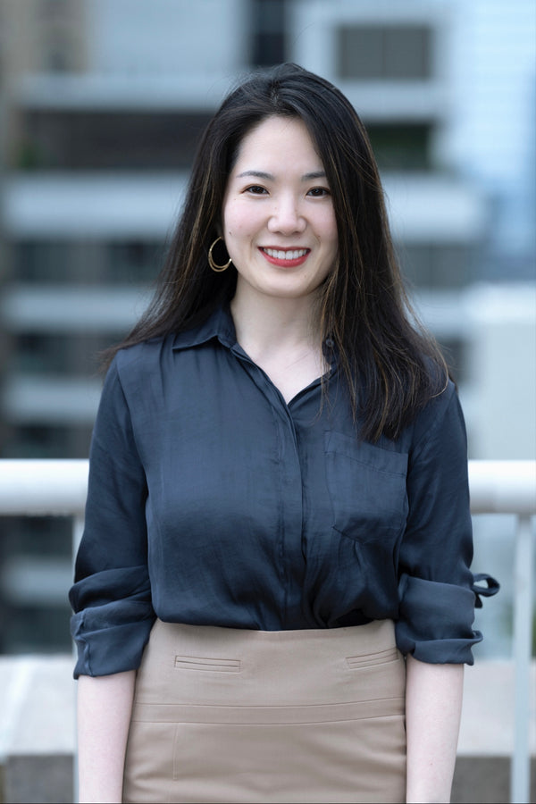 Professional corporate headshot by Lena Di