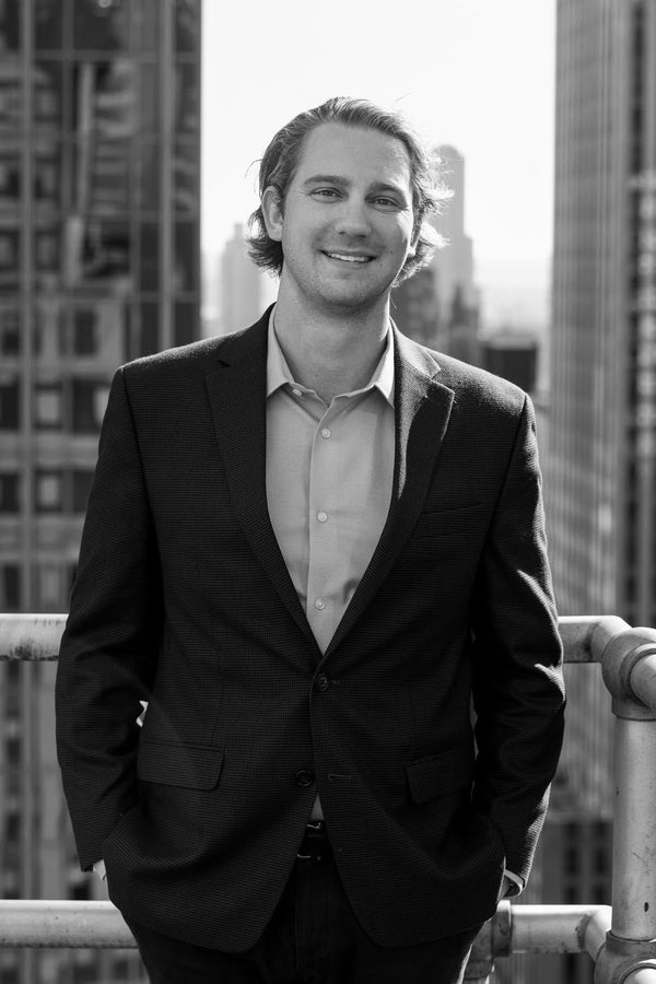 Professional corporate headshot by Lena Di