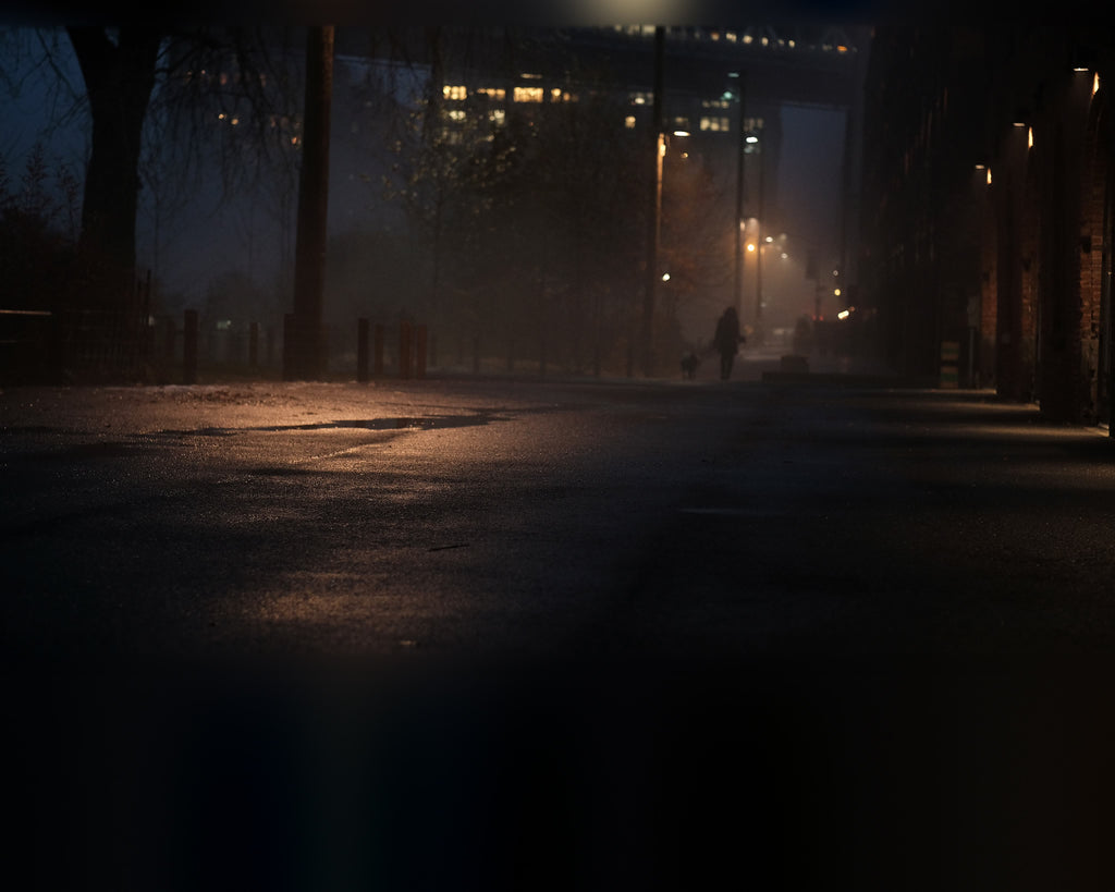 Night Walk, color dark city street at night with warm streetlight glow fine art photography print by Lena Di