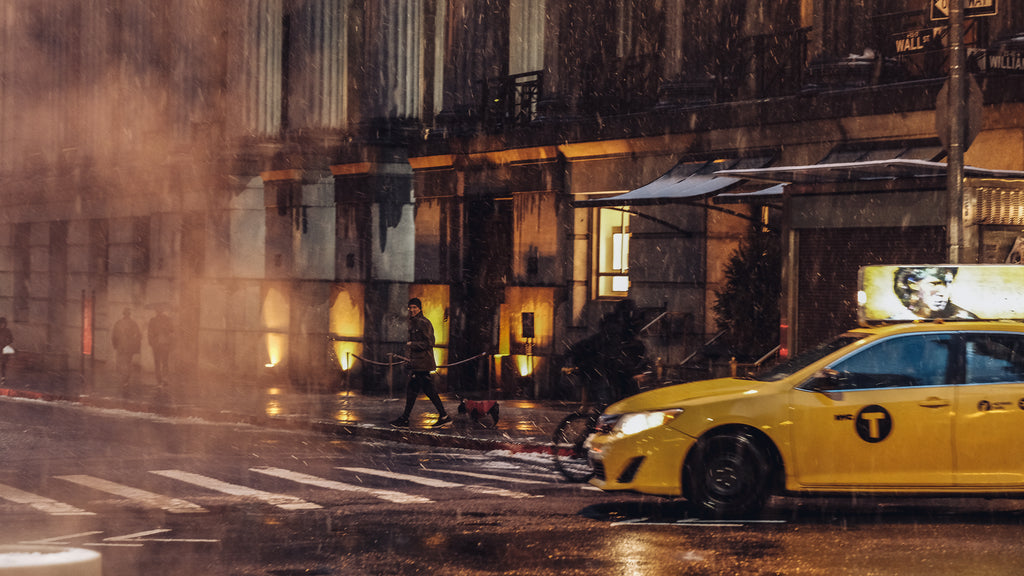 Wall Street Night, color yellow taxi on a rainy New York street at night fine art photography print by Lena Di